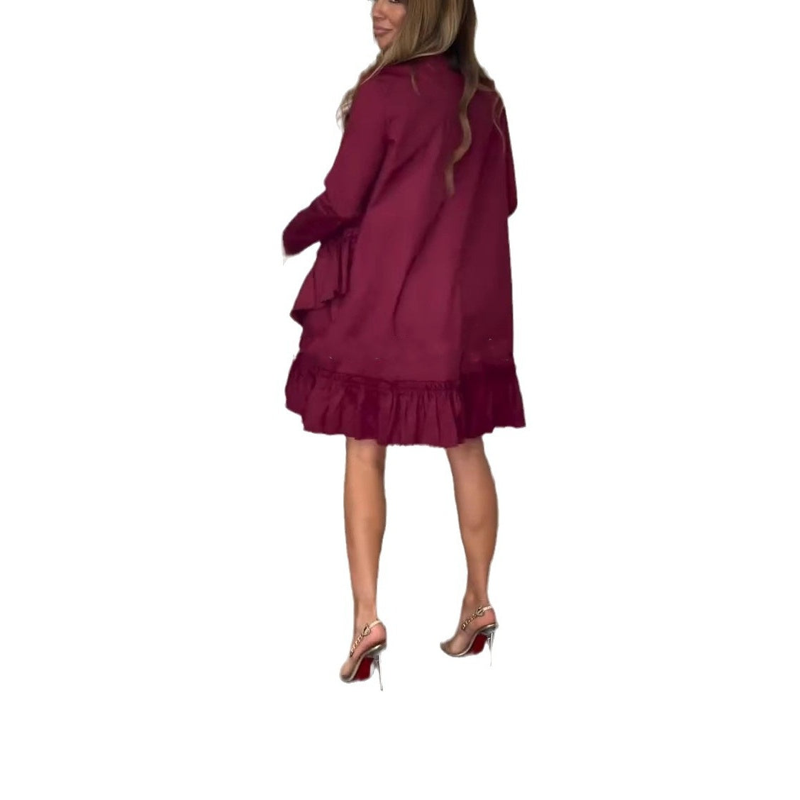Vestido para mujeres de manga larga con un escote circular y dobladillo con volantes
