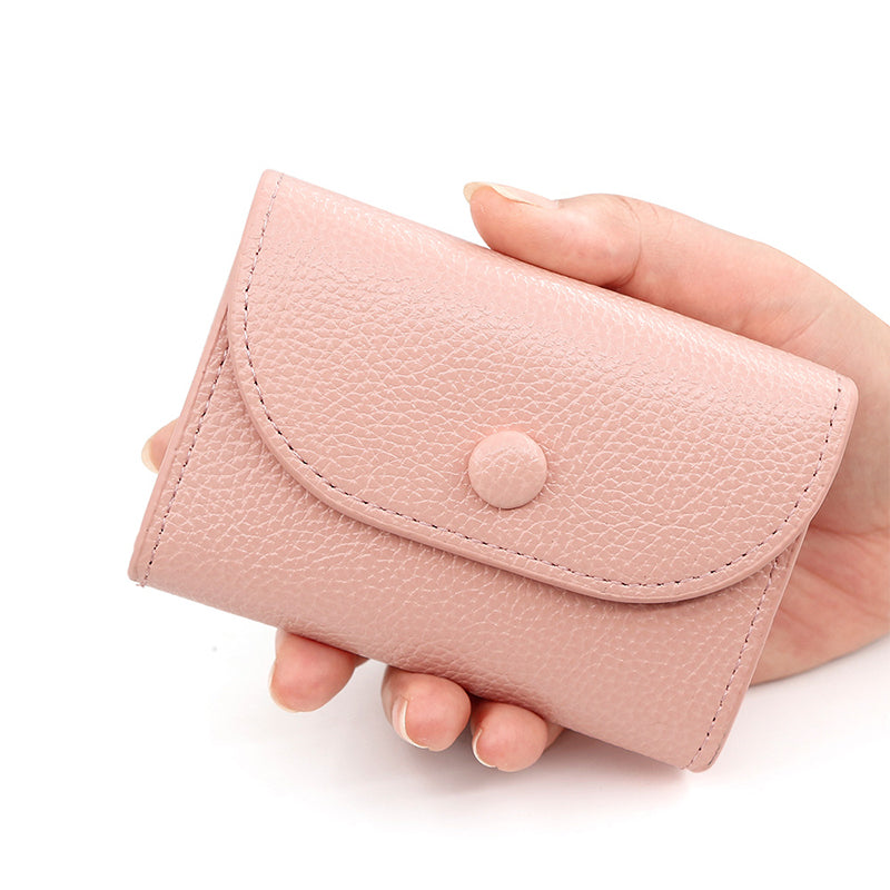 Billetera de moda hecha de cuero PU con patrón de lichi y práctico cierre de botones