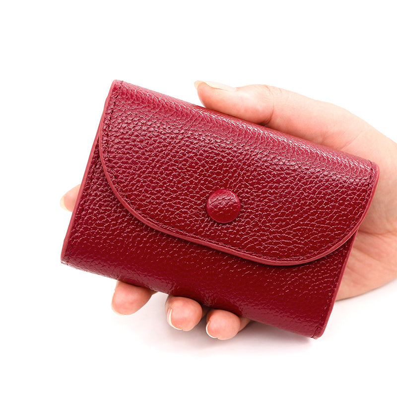 Billetera de moda hecha de cuero PU con patrón de lichi y práctico cierre de botones