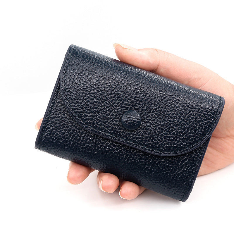 Billetera de moda hecha de cuero PU con patrón de lichi y práctico cierre de botones