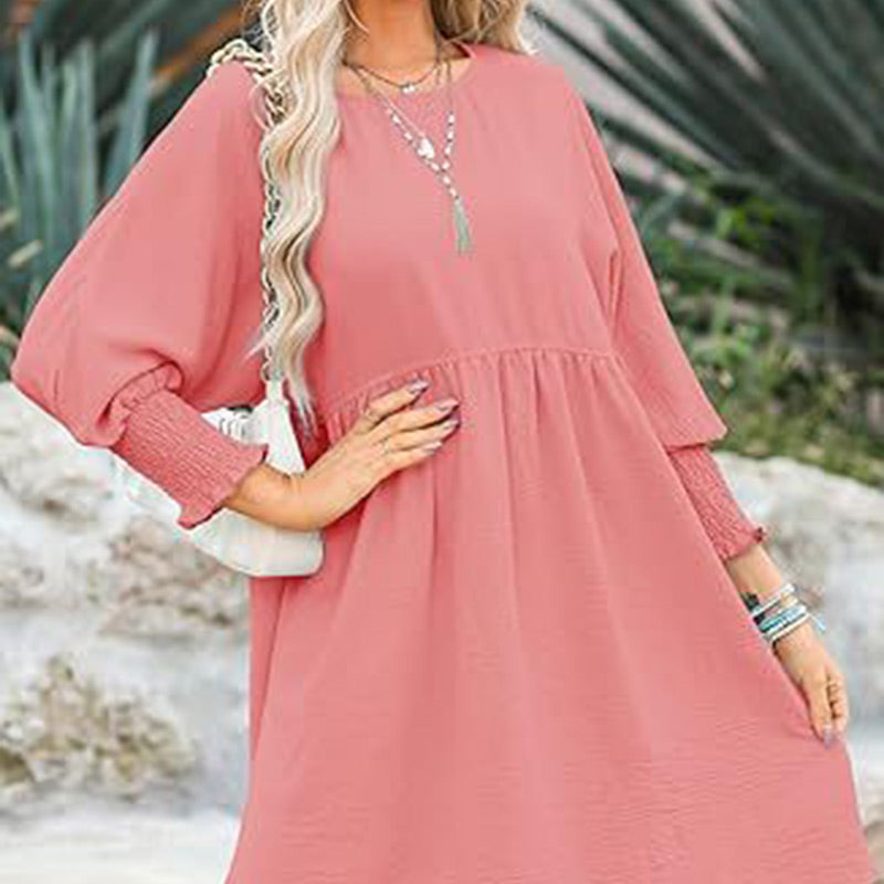Vestido con un escote circular y 3/4 mangas