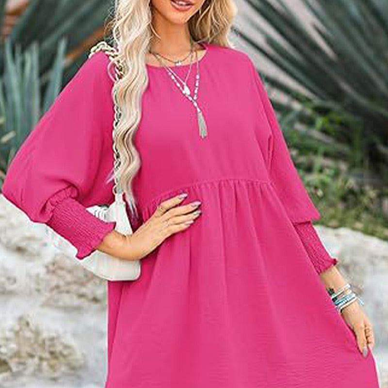 Vestido con un escote circular y 3/4 mangas