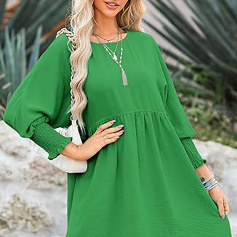Vestido con un escote circular y 3/4 mangas
