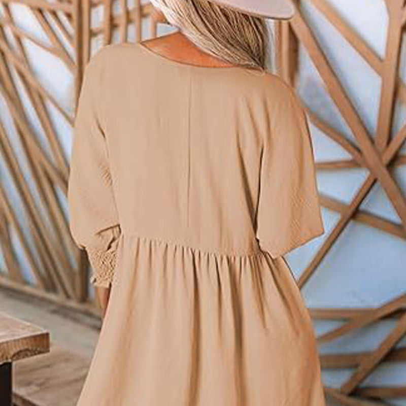 Vestido con un escote circular y 3/4 mangas