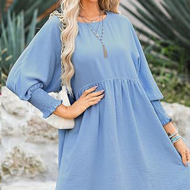 Vestido con un escote circular y 3/4 mangas
