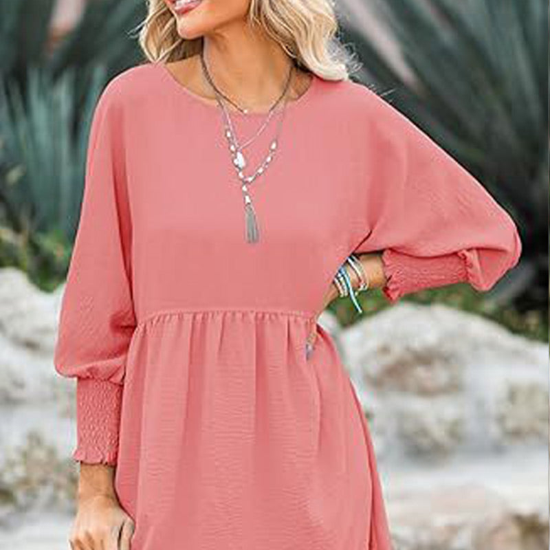 Vestido con un escote circular y 3/4 mangas