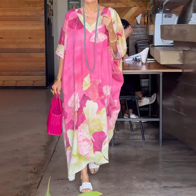 Vestido largo suelto con patrón de flores y medias mangas