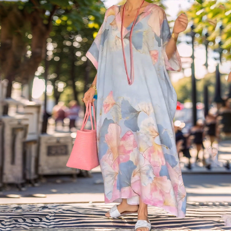 Vestido largo suelto con patrón de flores y medias mangas