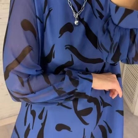 Vestido a largo plazo para mujeres con un corte suelto, escote circular y diseño de presión