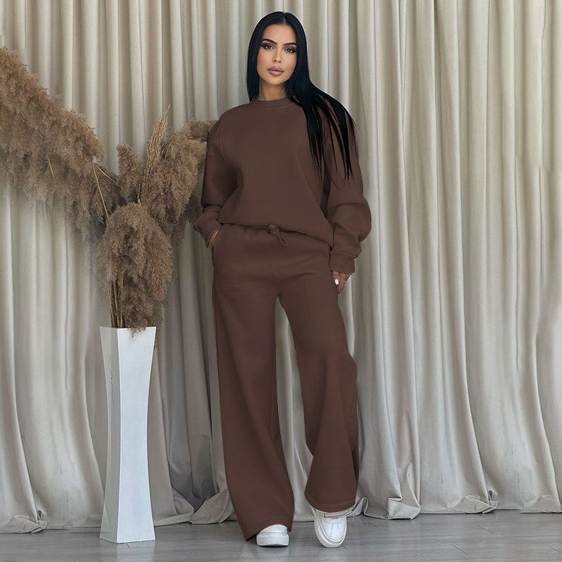Conjunto de dos partes de moda hecha de top solo con un solo color, suelto y manga larga con un escote circular y pantalones