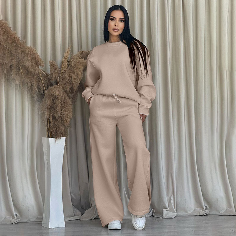 Conjunto de dos partes de moda hecha de top solo con un solo color, suelto y manga larga con un escote circular y pantalones
