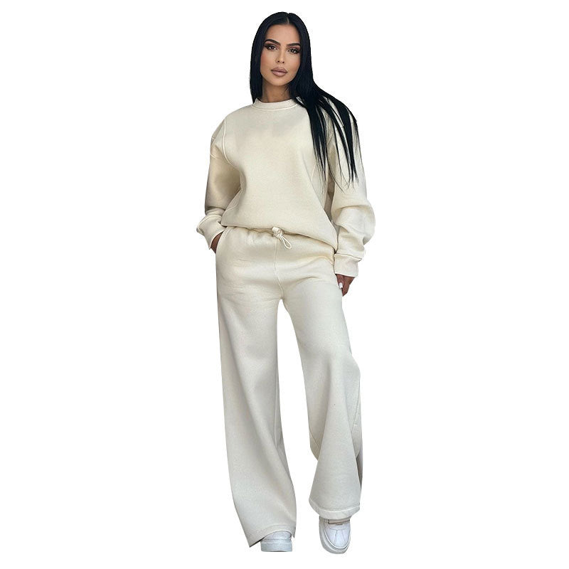 Conjunto de dos partes de moda hecha de top solo con un solo color, suelto y manga larga con un escote circular y pantalones