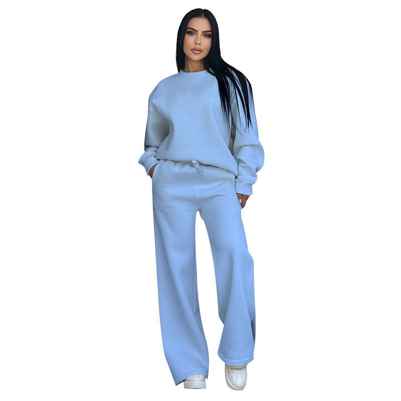 Conjunto de dos partes de moda hecha de top solo con un solo color, suelto y manga larga con un escote circular y pantalones