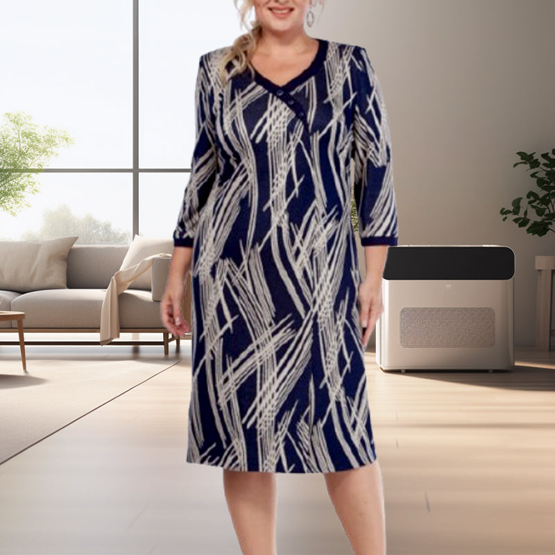 Vestido de mujer elegante con un estampado abstracto y 3/4 de mangas