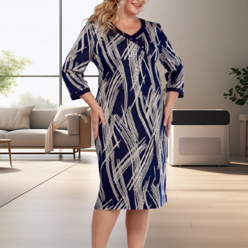 Vestido de mujer elegante con un estampado abstracto y 3/4 de mangas
