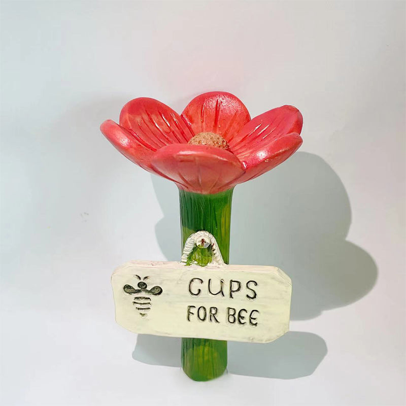 Abreuvoir en forme de fleur avec piquet de jardin pour abeilles