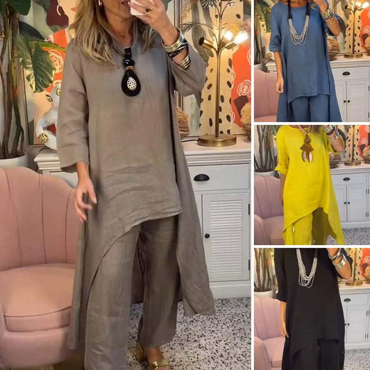 Set de dos partes de las mujeres: tapa asimétrica y pantalones