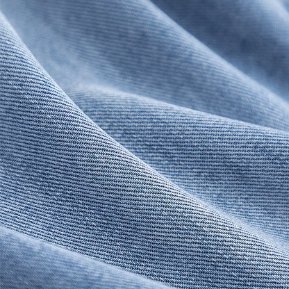 Gabardina media de largo con costuras de jeans de mezclilla