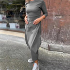 Einfaches, elegantes Damenkleid mit langen Ärmeln und Tasche