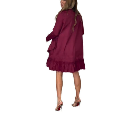 Vestido para mujeres de manga larga con un escote circular y dobladillo con volantes