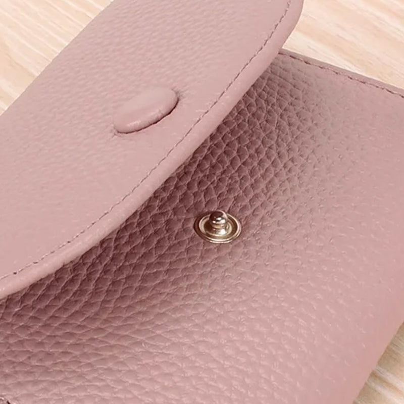 Billetera de moda hecha de cuero PU con patrón de lichi y práctico cierre de botones