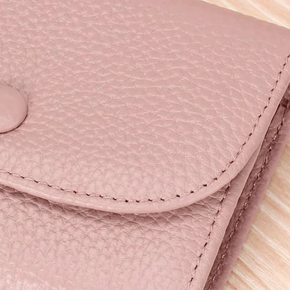 Billetera de moda hecha de cuero PU con patrón de lichi y práctico cierre de botones