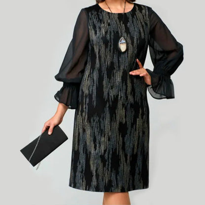 Vestido para mujeres impresas con un escote circular y mangas largas de malla