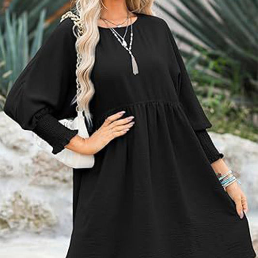 Vestido con un escote circular y 3/4 mangas