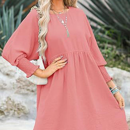 Vestido con un escote circular y 3/4 mangas