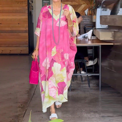 Vestido largo suelto con patrón de flores y medias mangas