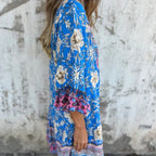 Lässiges Kleid mit Blumenmuster, V-Ausschnitt und Knopfverschluss
