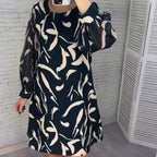 Damen-Langarmkleid mit lockerem Schnitt, Rundhalsausschnitt und Druckdesign
