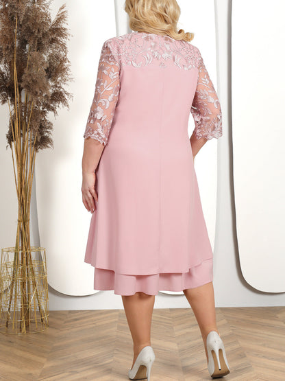 Vestido para mujeres hecho de gasa bordada con un escote redondo