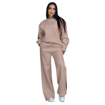 Conjunto de dos partes de moda hecha de top solo con un solo color, suelto y manga larga con un escote circular y pantalones