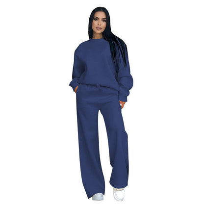 Conjunto de dos partes de moda hecha de top solo con un solo color, suelto y manga larga con un escote circular y pantalones