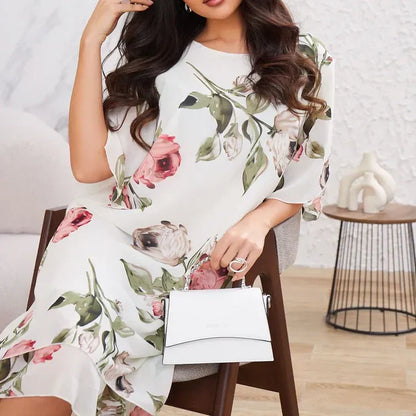 Vestido de gasa que fluye con pétalos de color rubor
