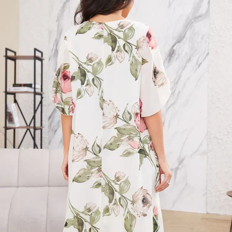 Vestido de gasa que fluye con pétalos de color rubor