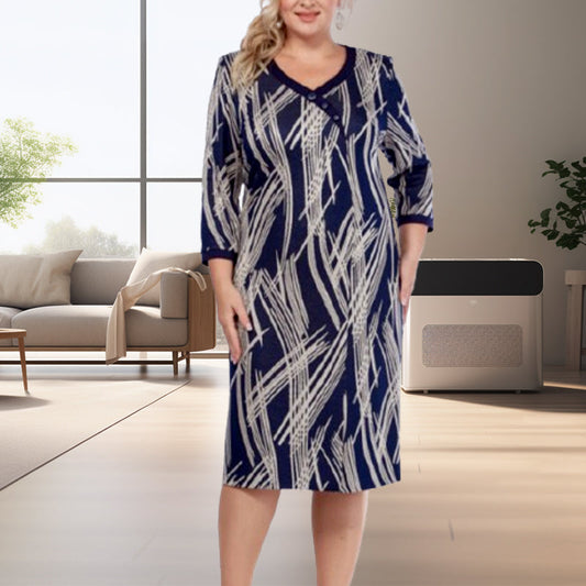 Vestido de mujer elegante con un estampado abstracto y 3/4 de mangas