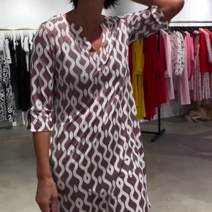 Vestido casual de línea A de mujeres con cuello en V y presión