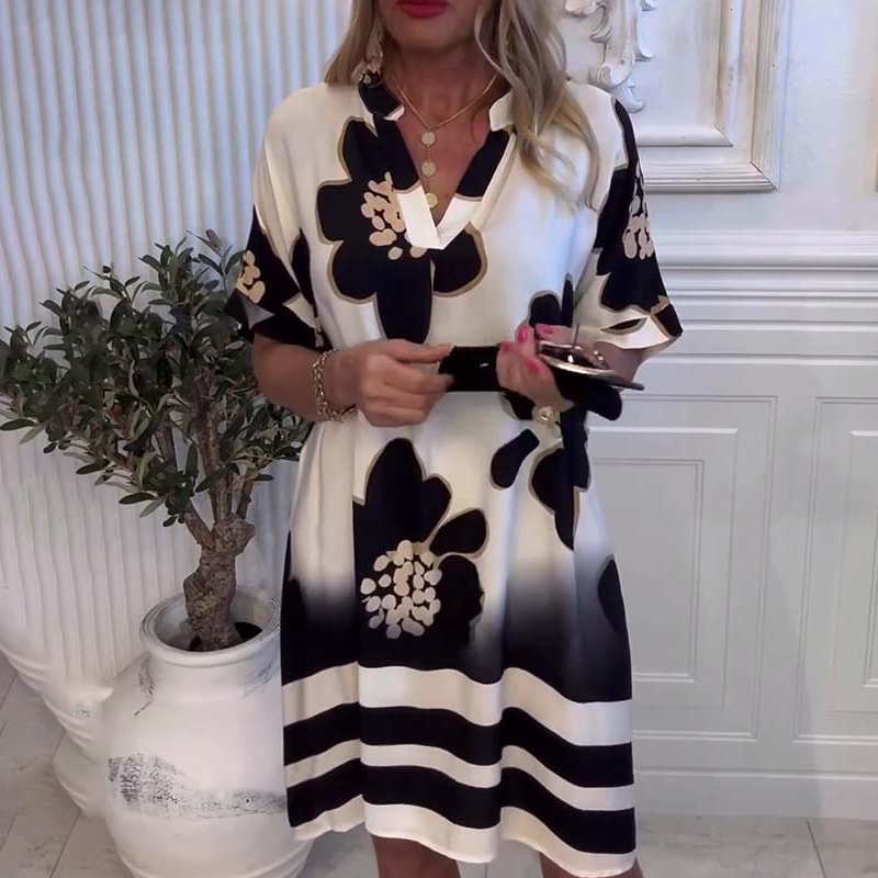 Locker geschnittenes Damenkleid mit Print und tiefem Tunika-Ausschnitt